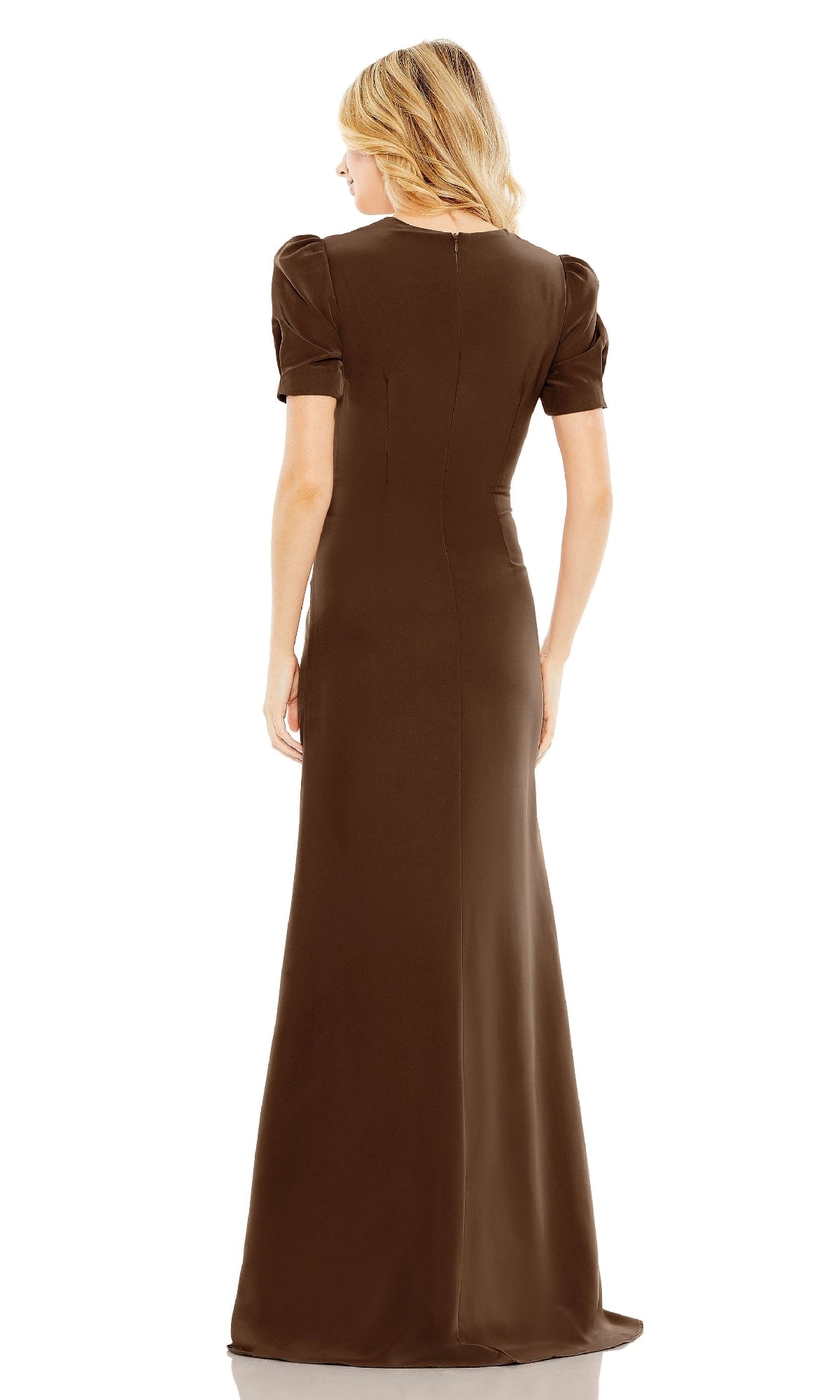 A blonde woman is shown from the back against a white background, wearing the Mac Duggal 2630 short-sleeve long formal dress in brown.